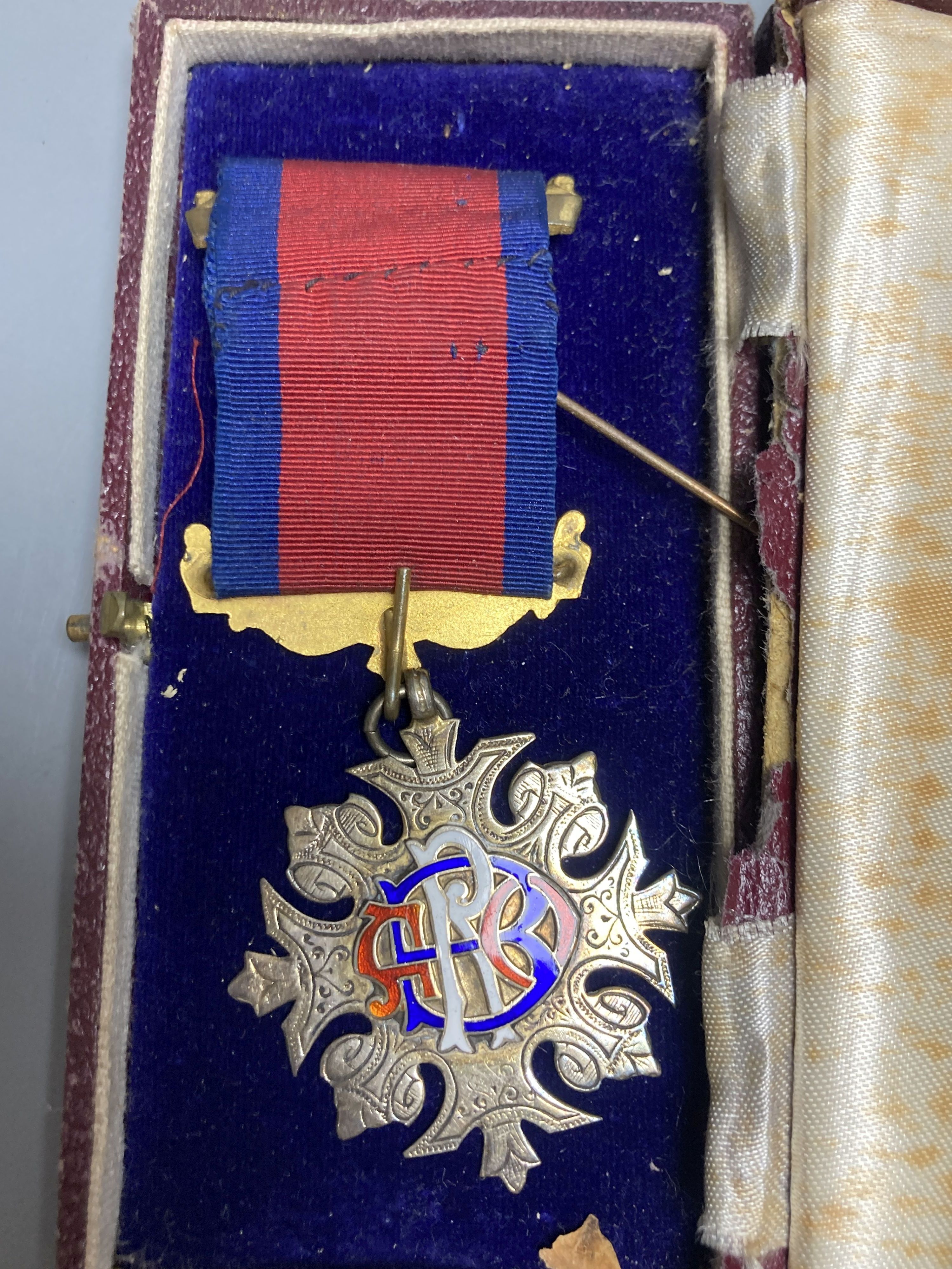 Five assorted early to mid 20th century including silver gilt and enamel masonic jewels & a 1935 Silver Jubilee Medal